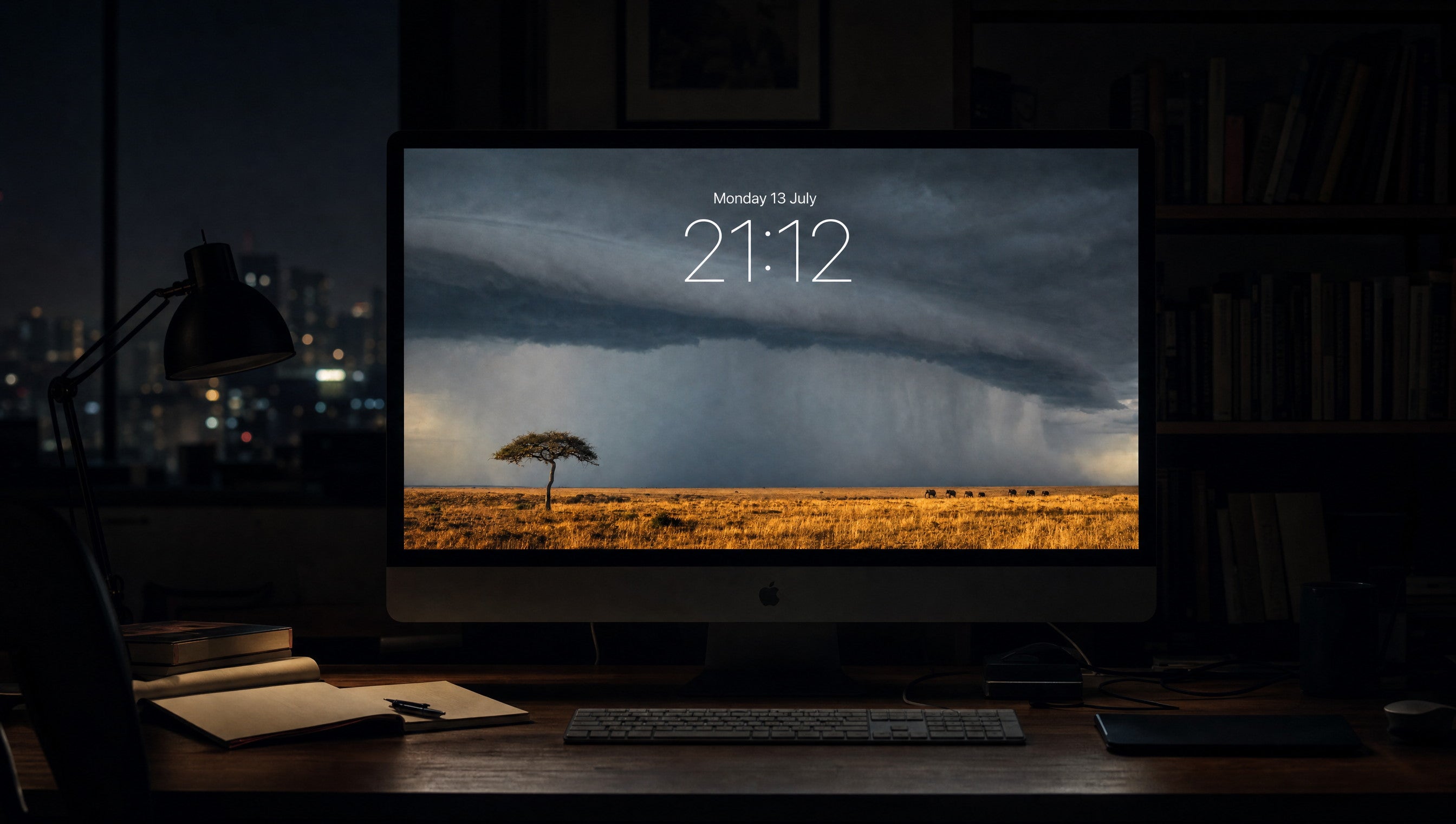 The Coming Rain wallpaper on a large display in a dark studio office at night