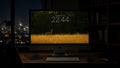 The Clearing wallpaper on a 27-inch display in a dark studio office at night