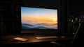 Daybreak free wallpaper on a large display in a dark studio office at dawn