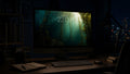Kelp Cathedral wallpaper on a large display in a dark studio office at night